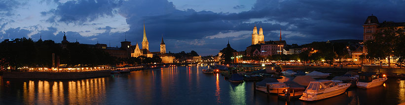 das klassische Panorama auf die Limmat und Z�rich. Von der 
      Quaibr�cke beim Bellevue aus gesehen. Aufnahme aus dem Jahr 2002 
      (Original hat 821 x 214 Pixel) (ZH-BN-05-P)